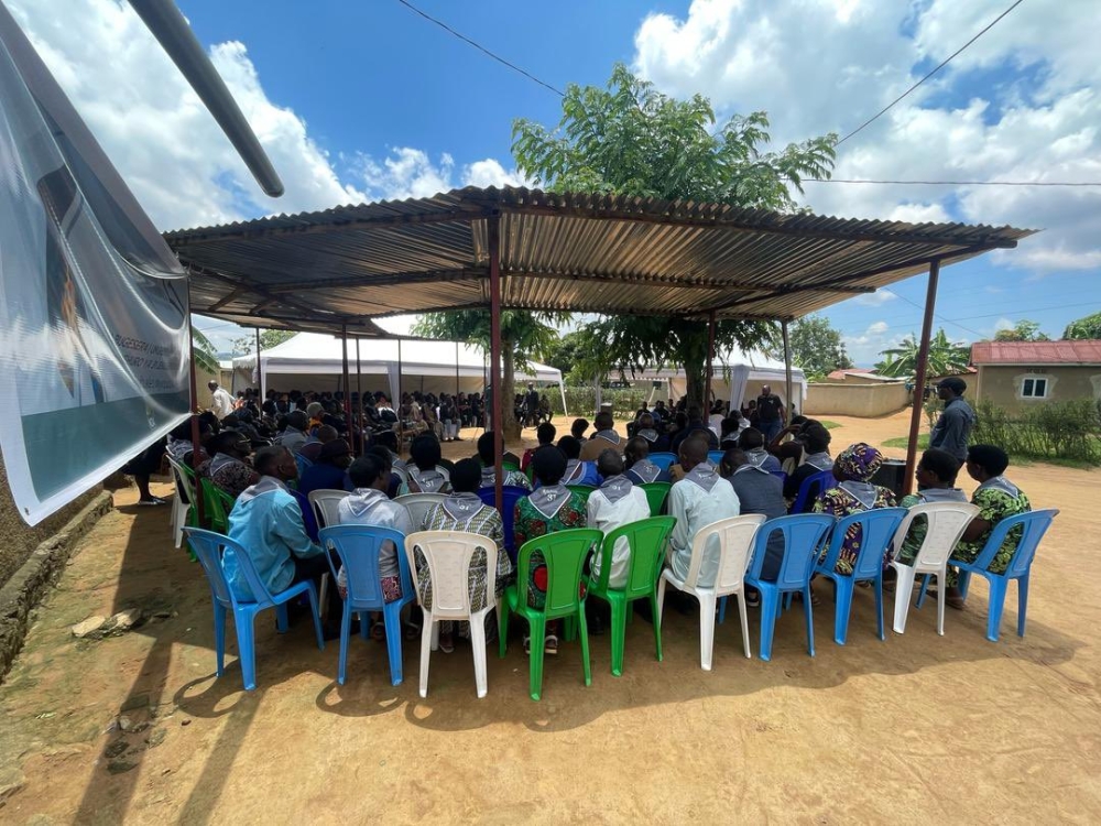 Residents of Mbyo reconciliation village that is home to 54 families who were brought together as part of a post-Genocide initiative aimed at fostering national unity.