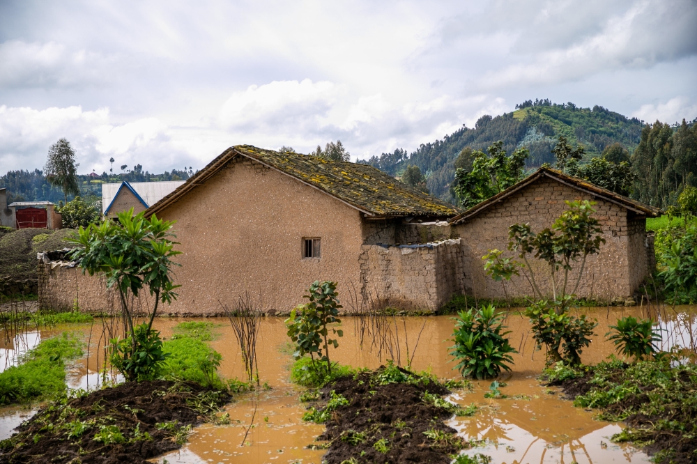 A residential house in a flooded area that was identified among the properties to be relocated from high risk zone in Nyabihu District. Photo by Olivier Mugwiza